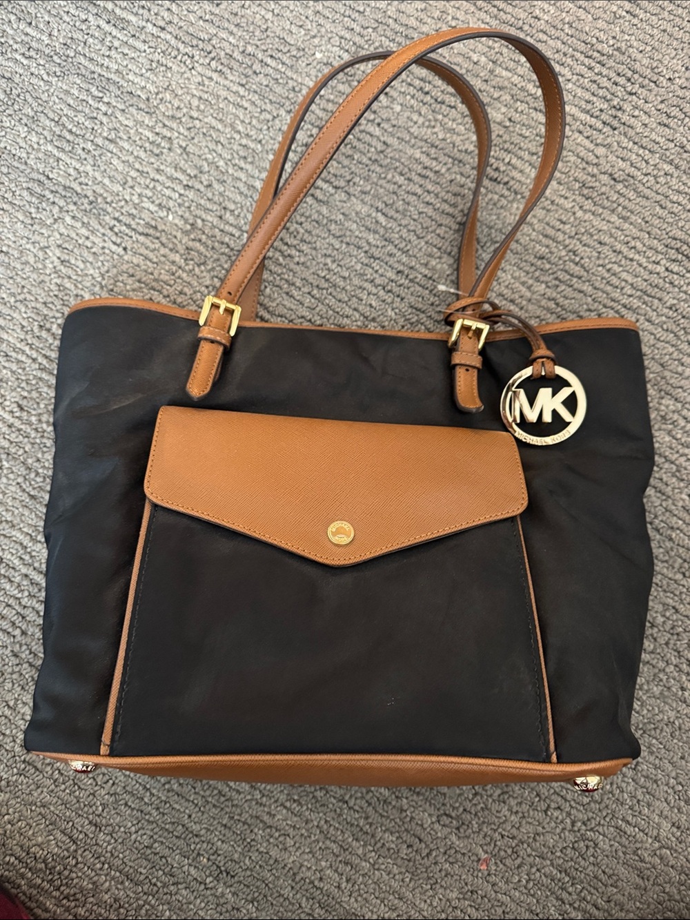 Michael Kors Black and Tan Convertible Tote with MK Charm